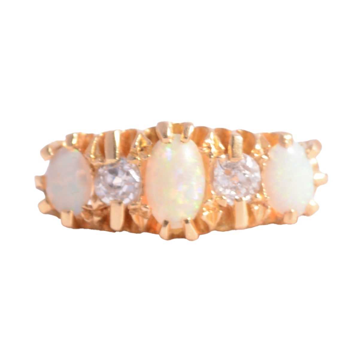 Lot 6 - An opal and diamond five stone ring.